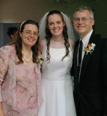 Proud parents and daughter bride